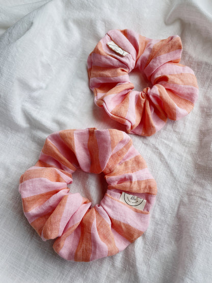 Striped linen scrunchies on  white piece of cloth