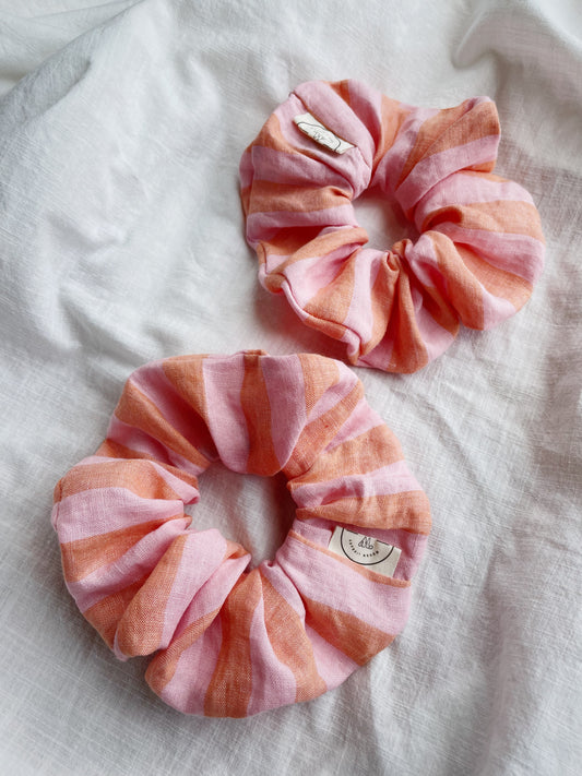 Striped linen scrunchies on  white piece of cloth